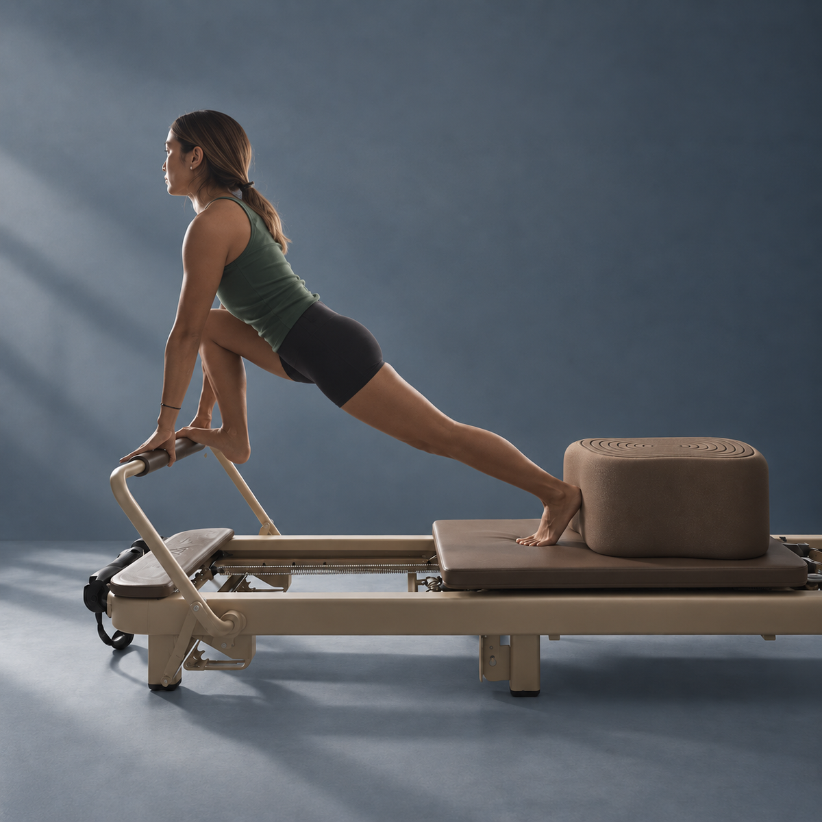 Pilates practitioner using Pebble for elevated movement