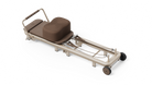 Elemental Pebble positioned on an Elemental reformer carriage